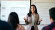 © Mari - Confident Indian Female Student Delivering Presentation in Modern Classroom
