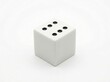 © Agnes - Single white dice with black dots.