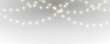 © dedstock - Bright Christmas garland glows with realistic light effects. Elegant hanging bulbs enrich winter celebration themes. Transparent background PNG.