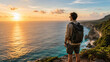 © LarisaM - Sunset glows over vast ocean, casting golden light across waves. Hiker stands on cliffside, gazing at horizon, backpack slung across shoulder. Distant coastline curves beneath sky