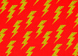 © Westend61 - Yellow pop art lightning bolt pattern on red background