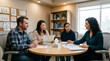 © krismicrostoker - Family gathers around round table in therapy room