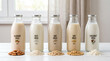 © MumarProject - Assorted plant based milk bottles including almond oat soy rice and coconut milk.