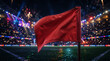 © Andrew - close up of a red corner flag lit up at a night time football sporting event under dramatic lighting.