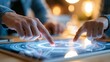 © Justlight - Closeup of a mentors hands pointing at a glowing circular roadmap on a tablet guiding a junior employee in a cozy home office with soft ambient lighting and a warm workspace.