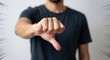 © Laurent - Close Up Of Man Hand Giving Thumbs Down Gesture With Dramatic Graphic Speed Lines