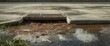 © CreativeBro - Turbid slurry flowing out from drainage storm grate