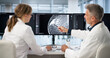 © Andrey Popov - Doctors Reviewing Breast Cancer Screening Results