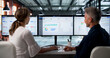 © Andrey Popov - Two Professionals Discuss ERP Software Integration