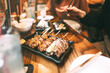 © dodotone - Grilled pork offal japanese style menu in Izakaya drink bar restaurant