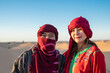 © Cavan Images - portrait of friends in the Sahara desert