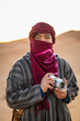 © Cavan Images - photographer with rangefinder camera in the Sahara