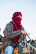 © Cavan Images - portrait of man wearing a turban in the Sahara desert