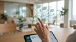 © KohXD - Person using a smartphone displaying a tree on the screen emphasizing technology and nature in an organic productivity system concept