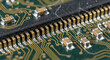 © shanum - Circuit Board Macro Close Up Showing Intricate Gold Connectors and Components