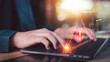 © Images for you - Cybersecurity analyst monitoring malware attack alerts on laptop with data breach warning, network protection, cyber threat detection, ransomware risk, and digital security monitoring.