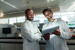 © Westend61 - Team of scientists evaluating research on a tablet in laboratory