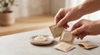 © Helen - Person comparing different sizes of latex contraceptives in minimalist packaging for safe sexual health