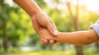 © intha - Parent-child bonding moment outdoor park family interaction green nature close-up perspective emotional connection highlighting trust and love