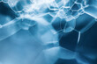 © Milena Wi - Abstract blue water bubbles texture with copy space, macro liquid foam structure for intensive hydration serum, mens grooming or refreshing cosmetic banner.