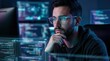 © Masque - Focused programmer wearing glasses analyzing complex computer code on digital screens.