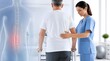 © Komang - Back pain, physiotherapy and elderly man with nurse for rehabilitation, spine health and medical care. Physiotherapist, senior and walking frame in clinic with anatomy, treatment and wellness rehab