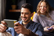 © Studio Firma/Stocksy - Fun with phones