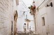 © Palina Liashkovich/Stocksy - Family vacation in Europe, Italy, Ostuni