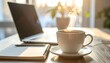 © Rendy Dastian - A steaming cup of coffee beside a laptop and notebook, aesthetic modern workspace, morning sunlight, productive ambiance