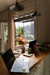 © Alba Vitta Studio/Stocksy - Workspace With Laptop and Person Relaxing Outside in Sunny Garden