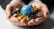 © MP-AI - Commodity prices outlook concept with globe and natural resources in hands symbolizing global market and economic future