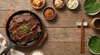 © muhammedali - Korean grilled beef short ribs galbi top view food photography on rustic wood background