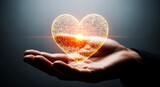 Glowing digital heart shape held in open palm with bright light technology