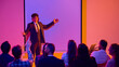© Lustre Art Group  - Male presenter opening discussion with raised hands in neon seminar room. Concept of interactive lecture, audience questions, startup pitch, leadership workshop and confident public speaking.