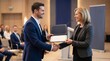 © Felippe Lopes - Man in Suit Receives Certificate and Shakes Hand with Woman in Blazer at Business Award Ceremony