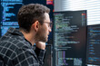 © Golf_MHNK - Male data scientist and software engineer code on multiple screens in a modern hybrid office building machine learning models optimizing databases and implementing AI driven solutions in daytime.