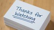© nakamuto - Stack of White Cards with Thanks for Watching Message