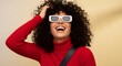 © MD HASANUZZAMAN - Joyful woman with curly hair wearing sunglasses and red sweater