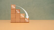 © Jill Dundee - Interest Rates Decline Concept With Wooden Blocks Percentage Graph And Downward Arrow For Finance