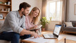 ©  VladaToday - Household budget planning with couple reviewing laptop report for personal finance, mortgage decision, expense tracking and family loan discussion.