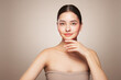 © Oleg Gekman - Beauty woman applying cream on her face. Young woman with clean fresh skin. Model with a jar of face cream