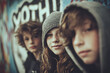 © ARSHDEEP - Three young friends with hooded sweatshirts pose against a vibrant graffiti wall, exuding a cool vibe.