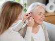 © Cantarela - Woman audiologist helping senior woman with hearing aid device. Professional fitting of digital medical equipment for elderly patient. Healthcare concept for hearing loss assessment.