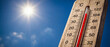 © TanTin - Summer heat wave, high temperature on outdoor thermometer under scorching sun. Hot weather, global warming