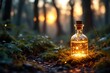 © wasis - Glowing potion bottle on forest floor, blurred background with sunset. Magic and fantasy