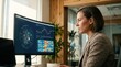 © David - A professional female data analyst working intently while looking at complex financial charts and network diagrams on a large computer monitor in a modern office setting