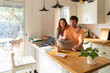 © Alba Vitta Studio/Stocksy - Couple Working Together in a Home Office