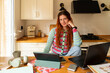 © Alba Vitta Studio/Stocksy - Woman Works at Home in a Kitchen