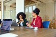 © Boris Jovanovic/Stocksy - Women talk during a meeting