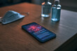 © Ekaterina Pokrovsky - Smartphone displaying a virus alert beside a face mask and hand sanitizer on a table, representing public health warnings, pandemic safety, mobile notifications and hygiene precautions